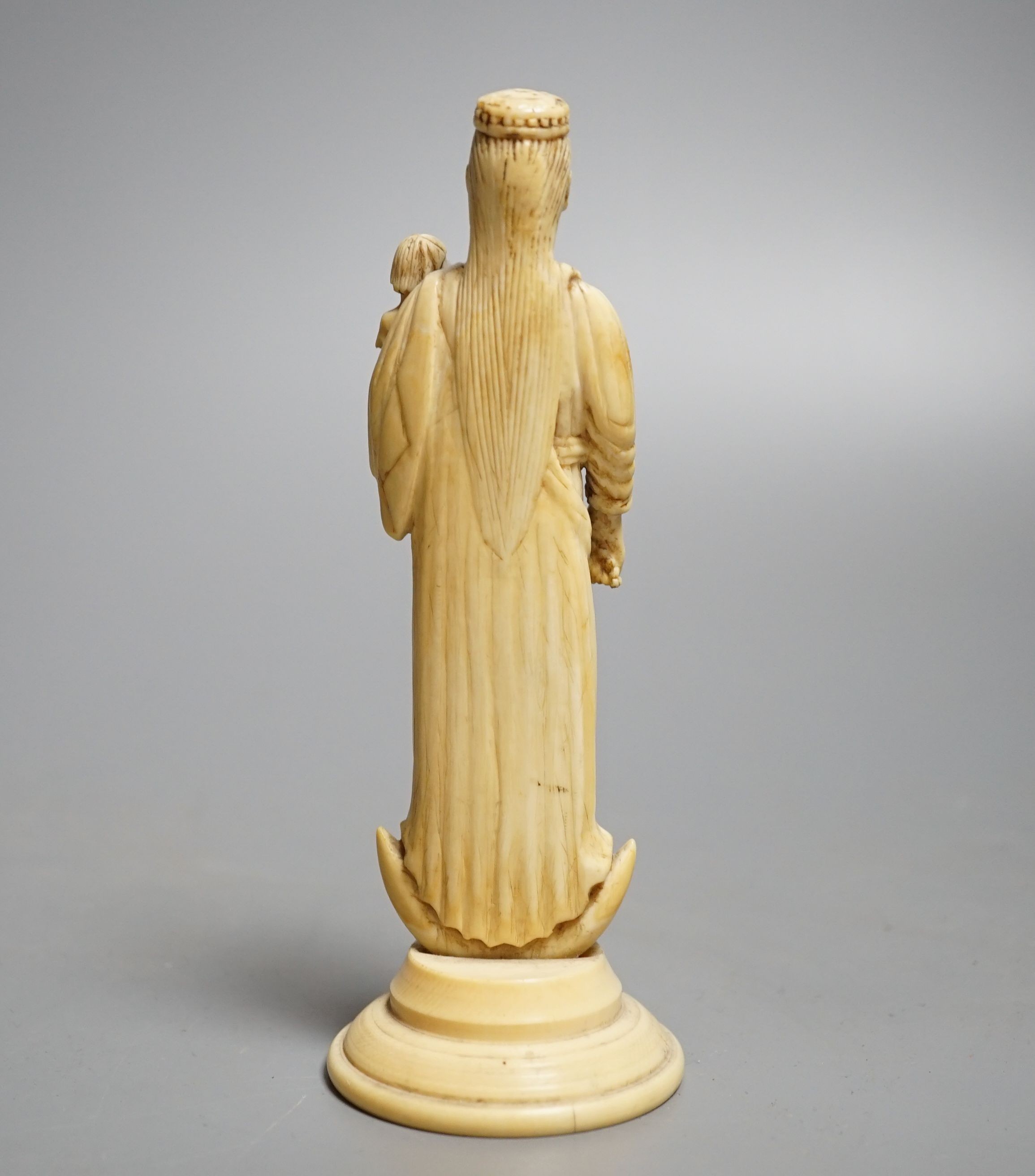 A 19th century Indo-Portuguese carved ivory model of the Virgin and child, height 15cm